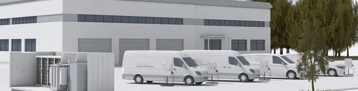 Frota de vans elétricas comerciais carregando em galpão industrial